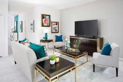 Excite Living Room. Tarpon Bay New Homes in Haines City, FL