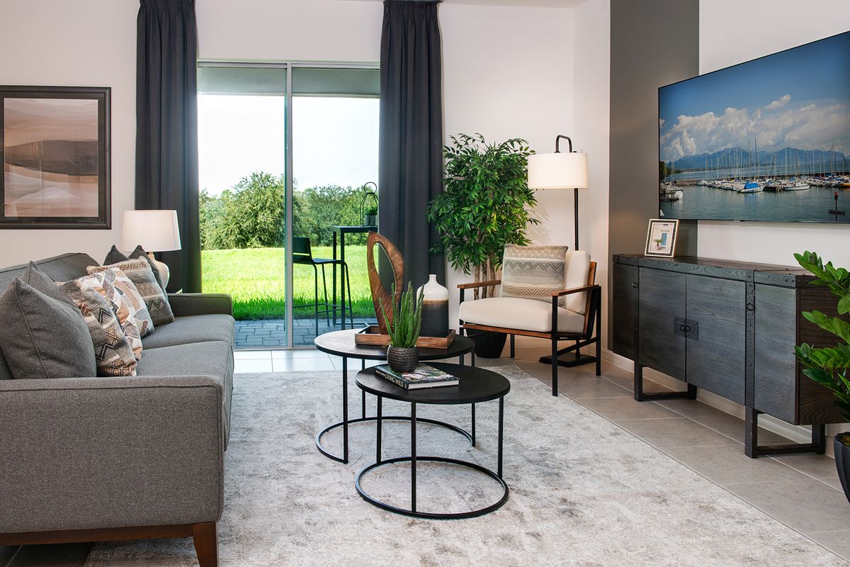 Evolve Living Room. Tarpon Bay New Homes in Haines City, FL