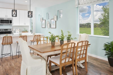 Dining Room. Leela Reserve Paired Villas New Homes in Tavares, FL