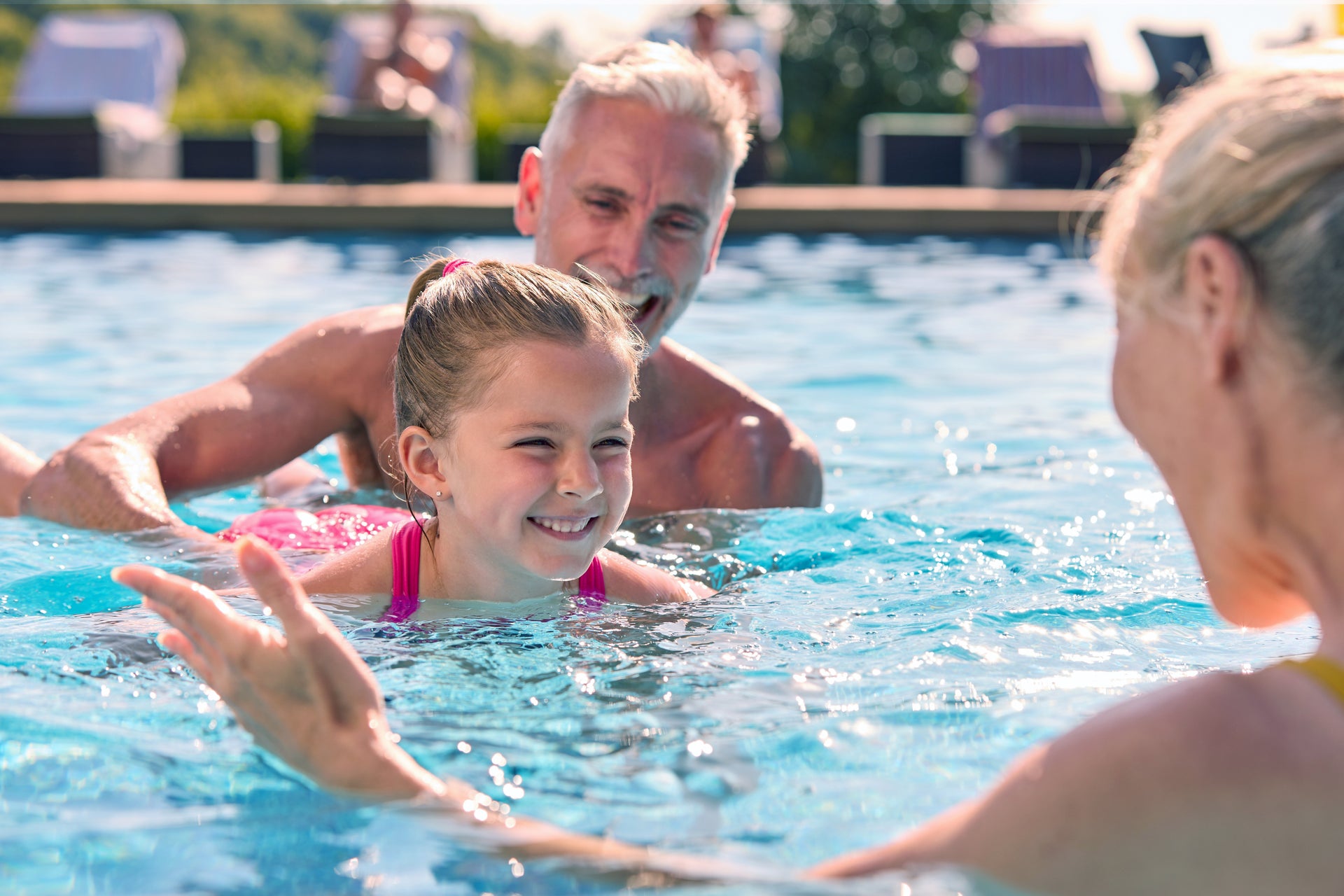 Pool with Grandparents. Leela Reserve Paired Villas New Homes in Tavares, FL
